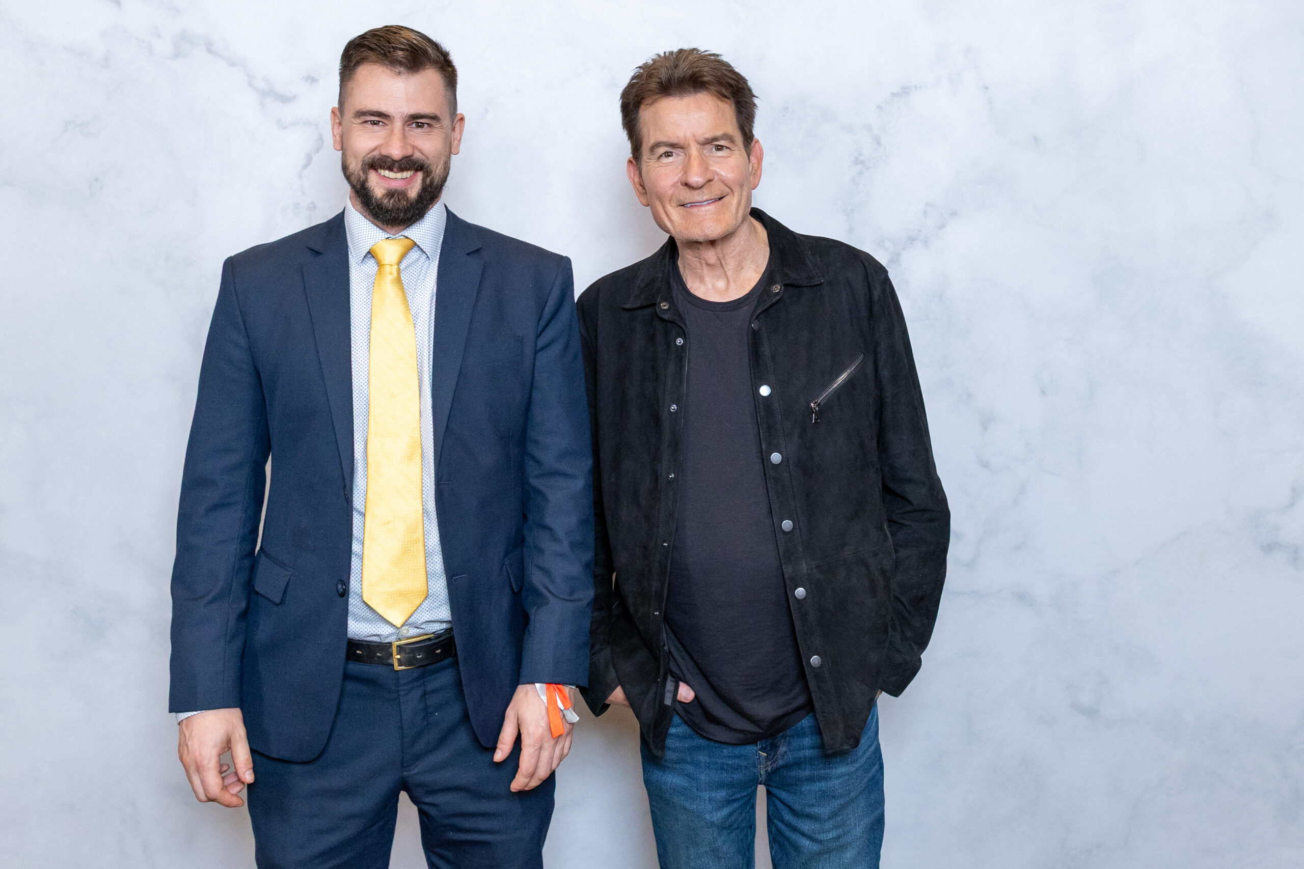Joel Racine and Charlie Sheen
