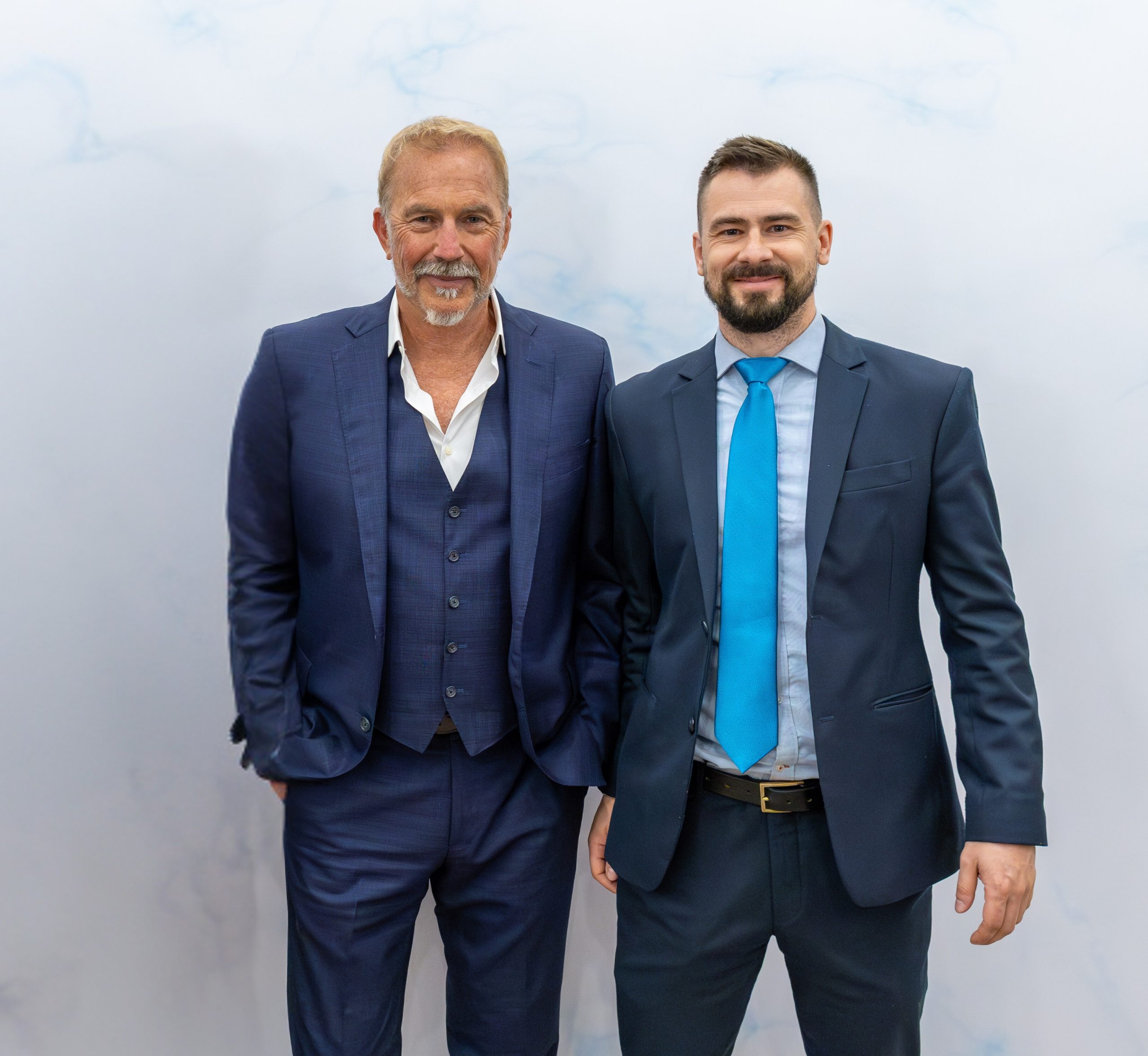 Joel Racine and Kevin Costner
